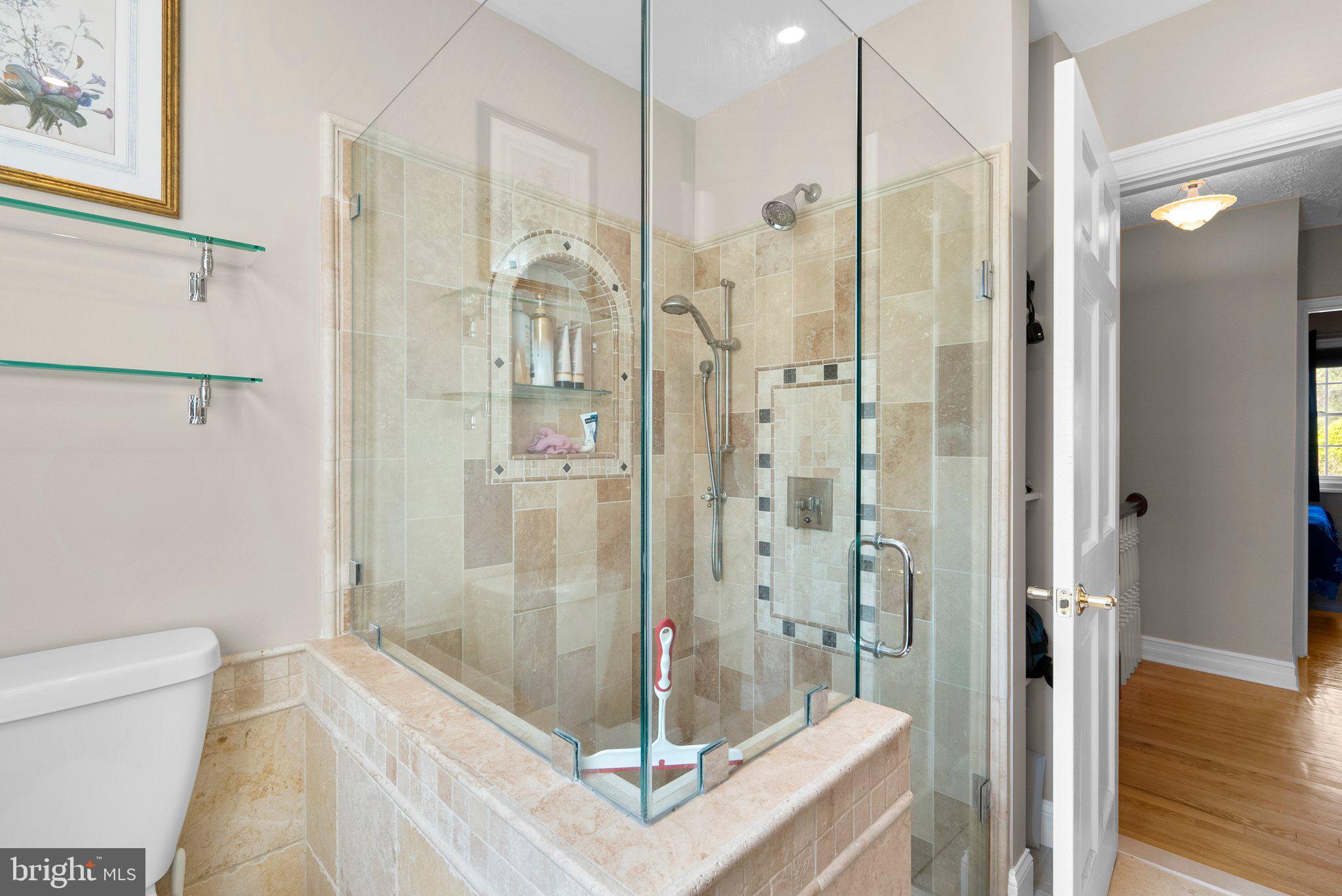 13131 Holdridge Road Silver Spring, MD 20906 - Photo 22 of 41 a bathroom with a shower and a toilet