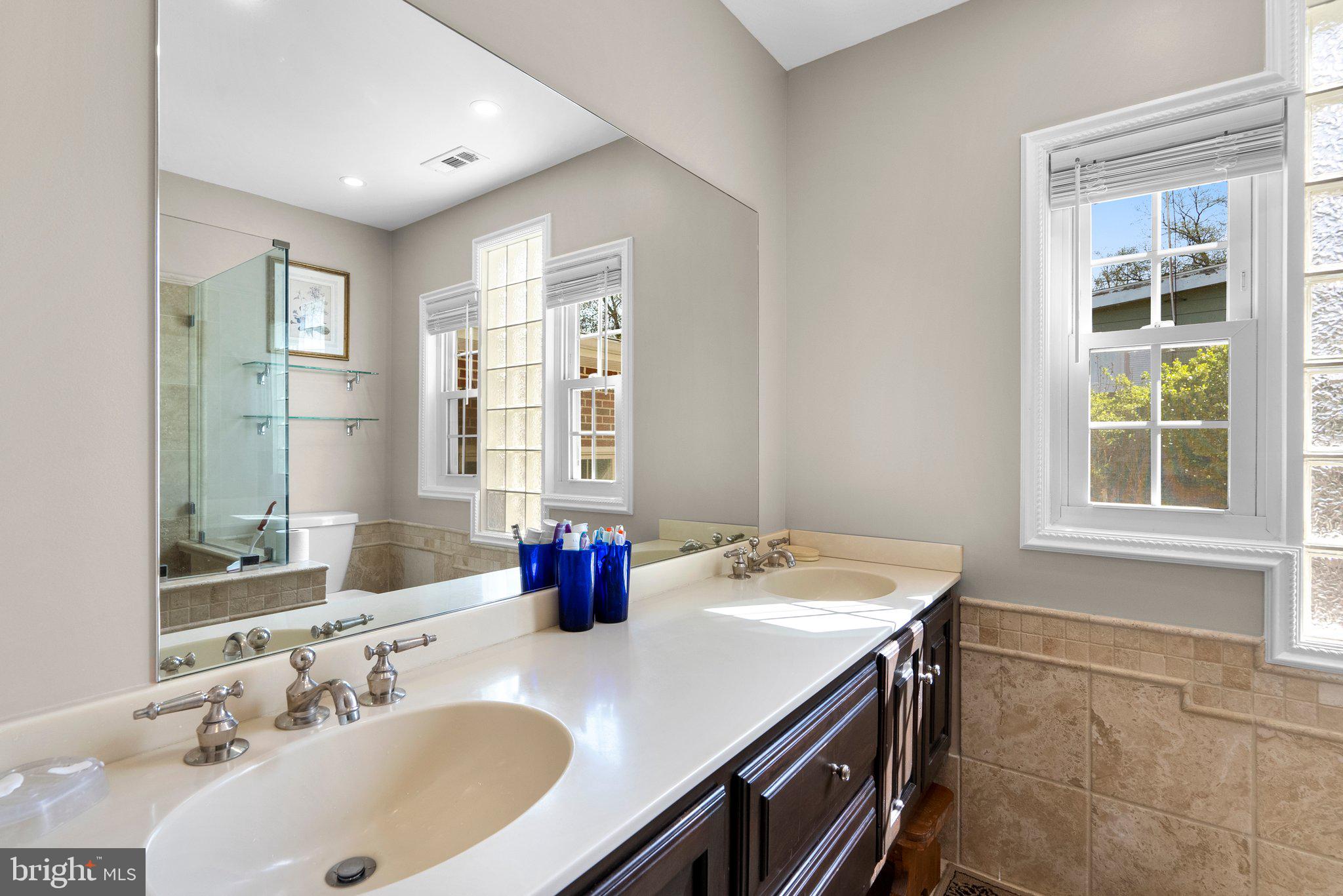 13131 Holdridge Road Silver Spring, MD 20906 - Photo 23 of 41 a bathroom with a sink and a window