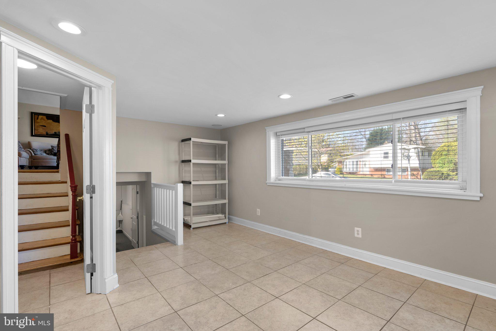13131 Holdridge Road Silver Spring, MD 20906 - Photo 28 of 41 a view of an empty room and a window