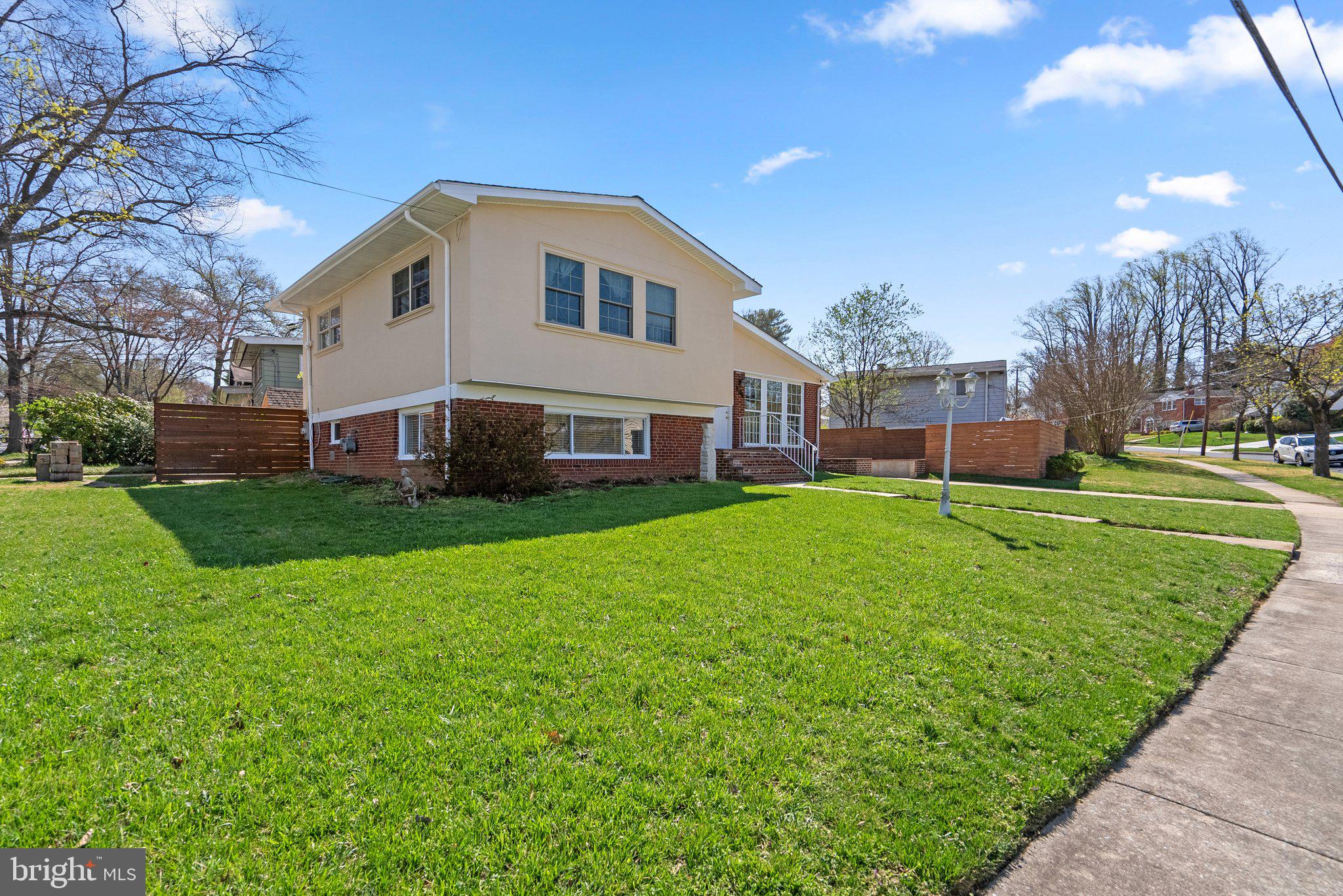 13131 Holdridge Road Silver Spring, MD 20906 - Photo 3 of 41 a front view of house with yard and green space