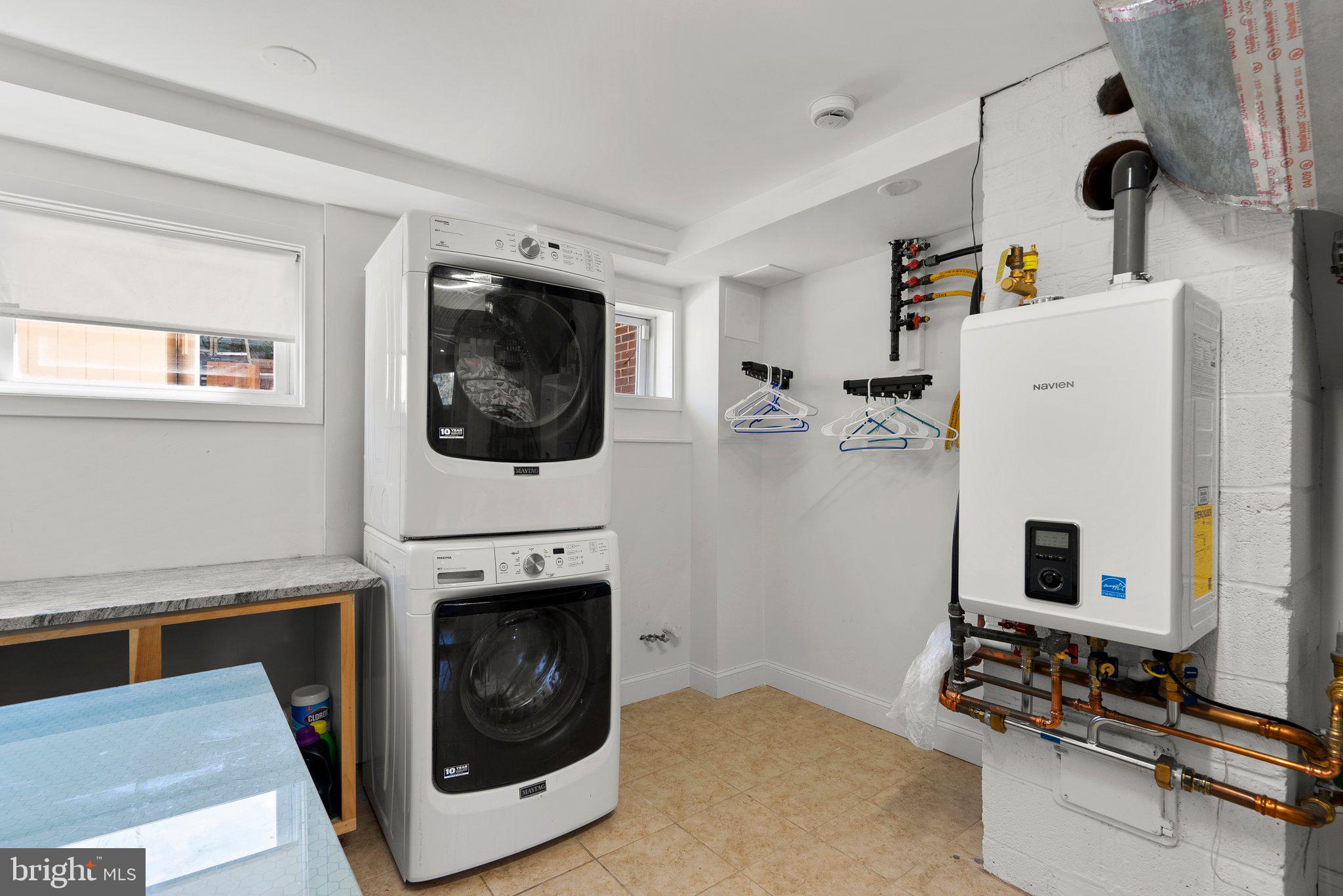 13131 Holdridge Road Silver Spring, MD 20906 - Photo 31 of 41 a living room with furniture and a fireplace