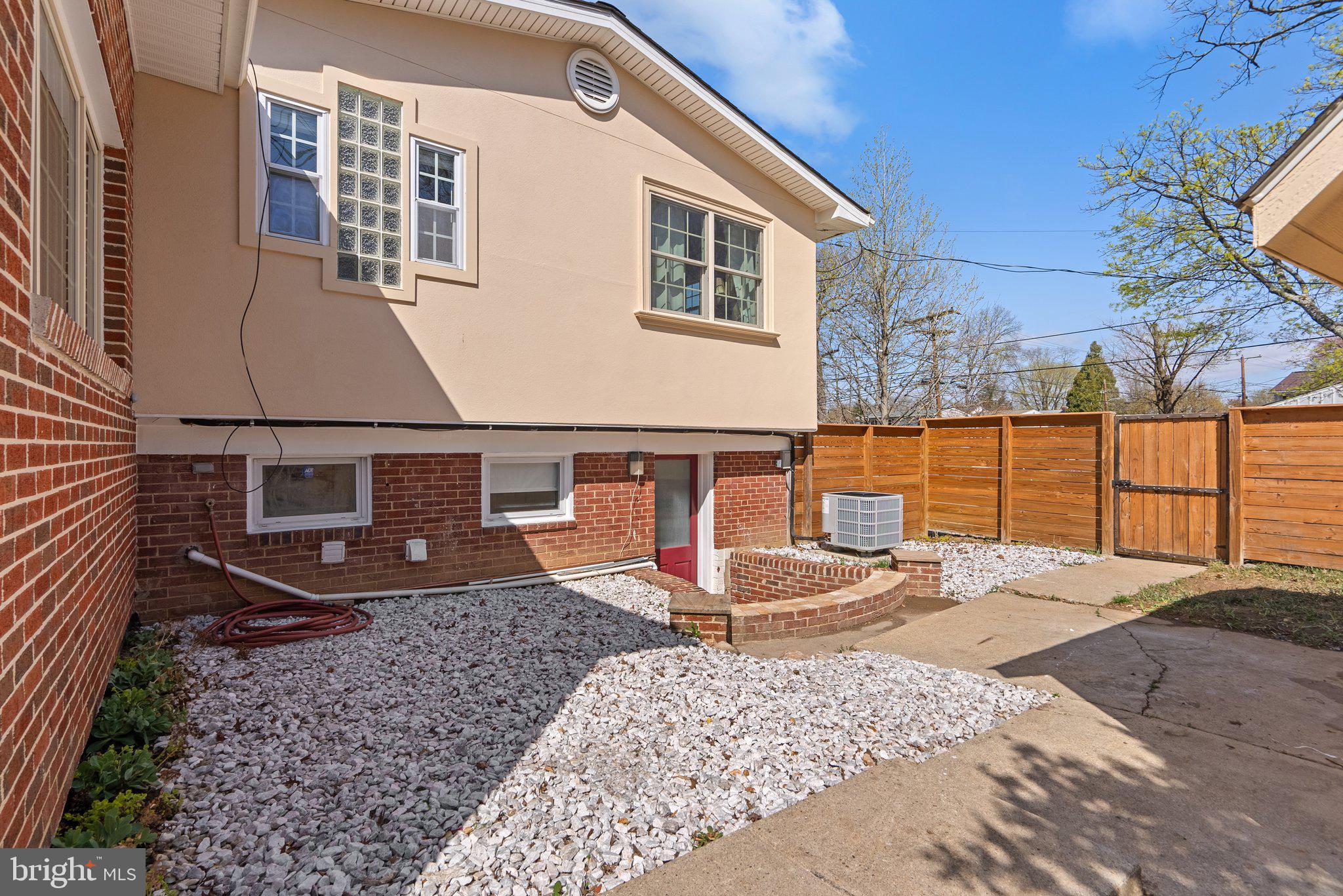 13131 Holdridge Road Silver Spring, MD 20906 - Photo 40 of 41 a backyard of a house with seating space