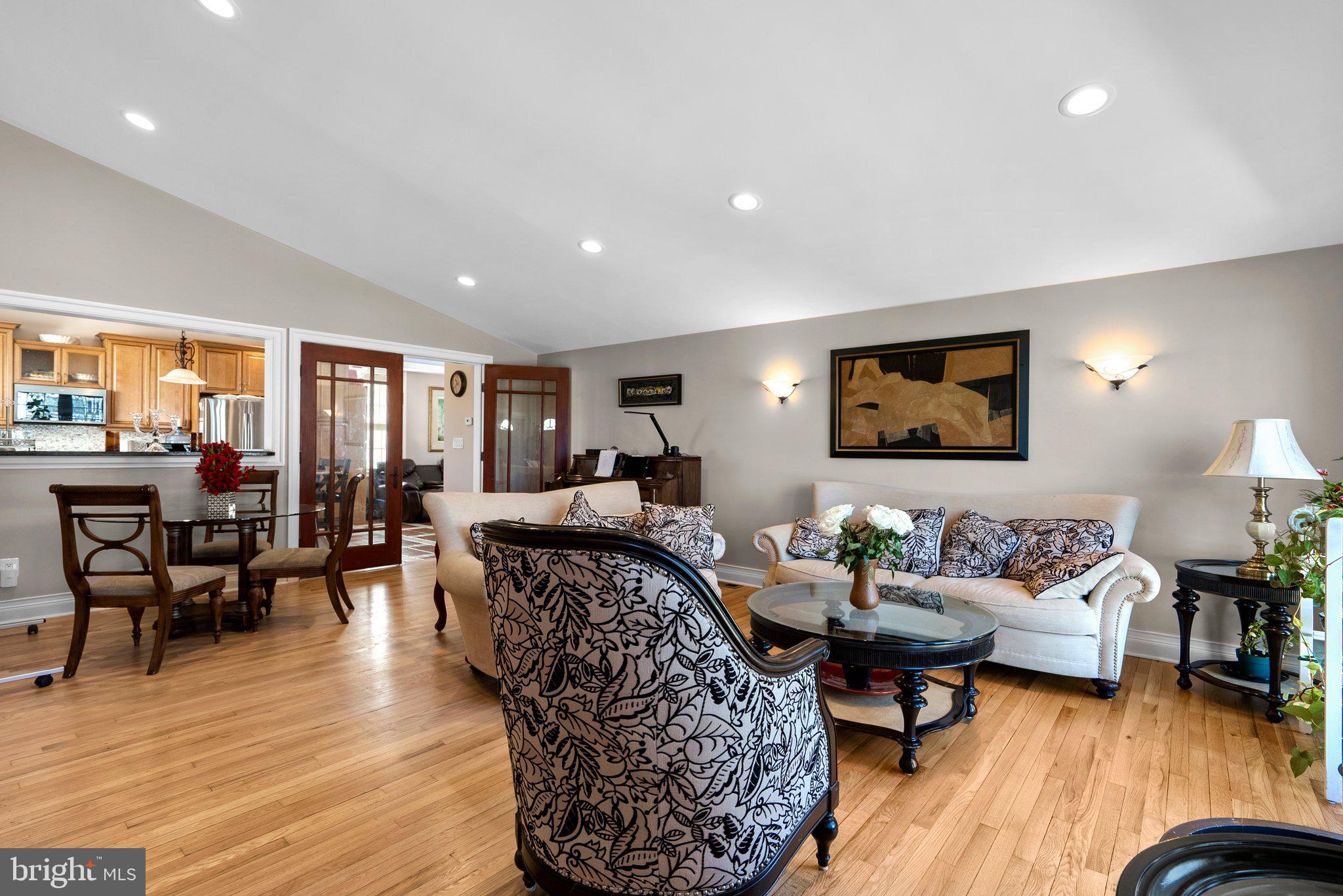 13131 Holdridge Road Silver Spring, MD 20906 - Photo 4 of 41 a living room with furniture and wooden floor