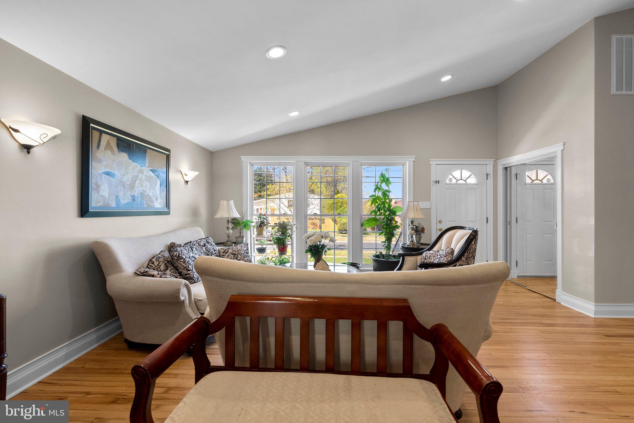 13131 Holdridge Road Silver Spring, MD 20906 - Photo 6 of 41 a dining room with furniture and wooden floor