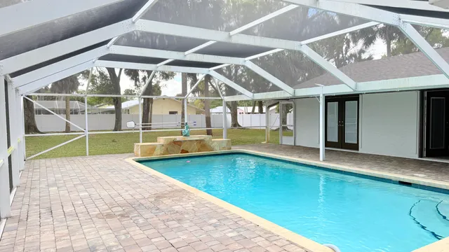 a view of a backyard of a house