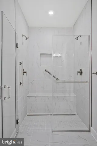 a view of a room with racks on the wall