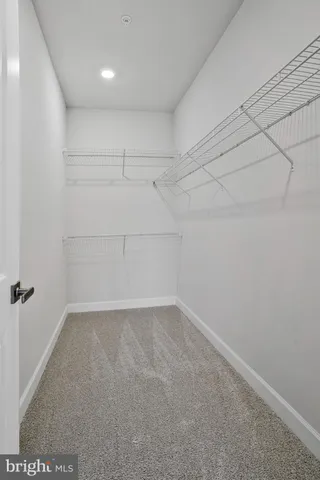 a view of a brick house with wooden floor