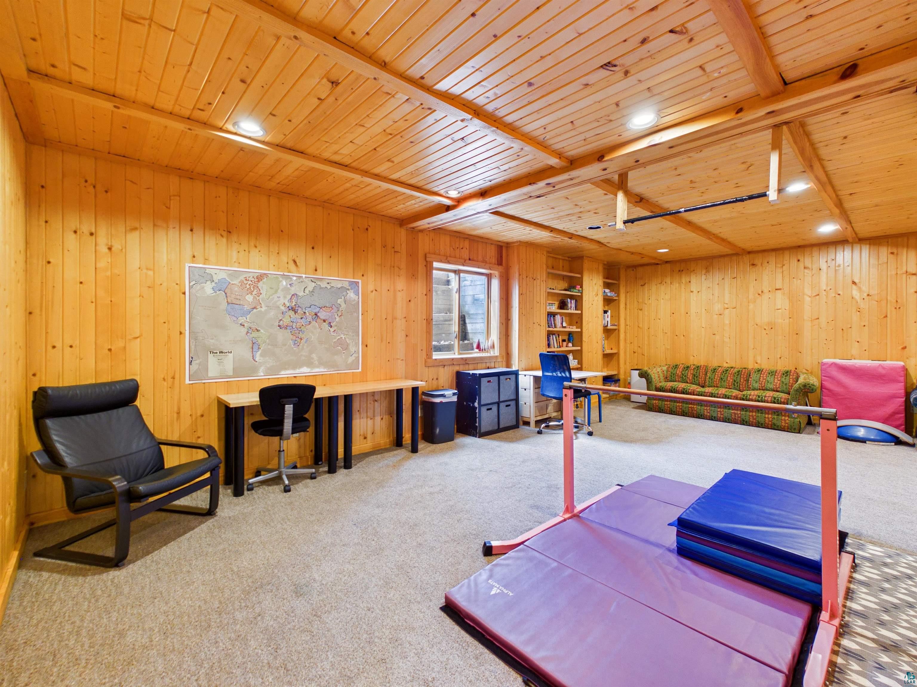 16539 Acorn Ridge Hayward, WI 54843 - Photo 44 of 58 Carpeted bedroom featuring wood walls, wood ceiling, and recessed lighting