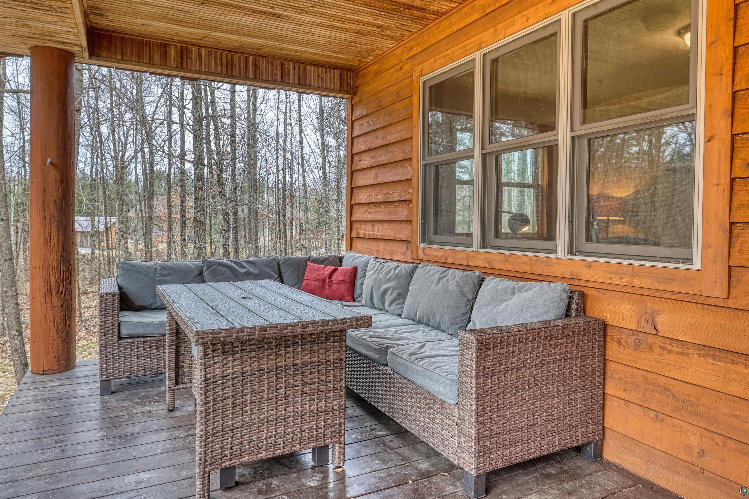 16539 Acorn Ridge Hayward, WI 54843 - Photo 9 of 58 Sunroom featuring an outdoor living space and a deck