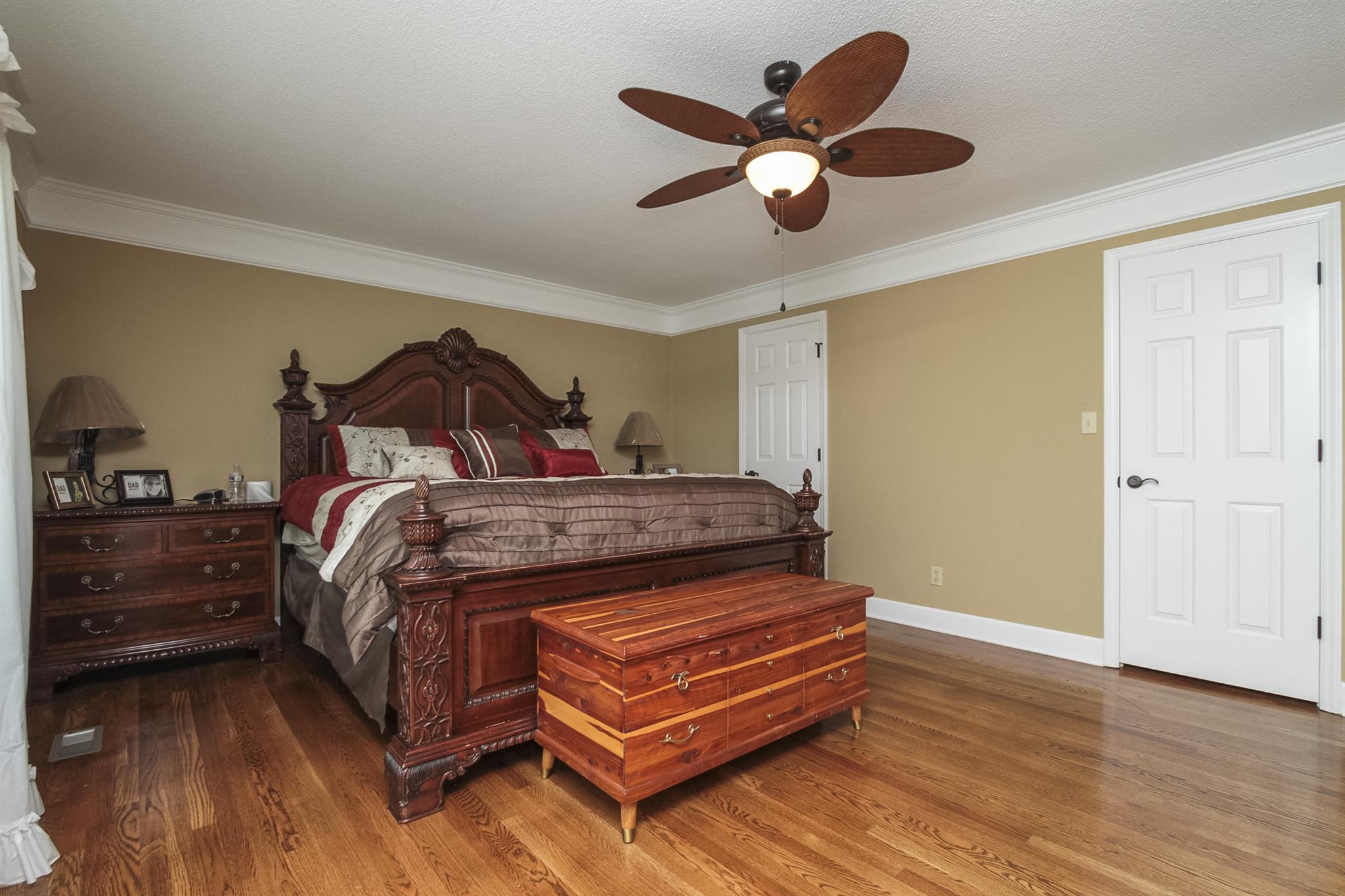 962 Alford Road Murfreesboro, TN 37129 - Photo 14 of 29 a bedroom with a bed and a chandelier