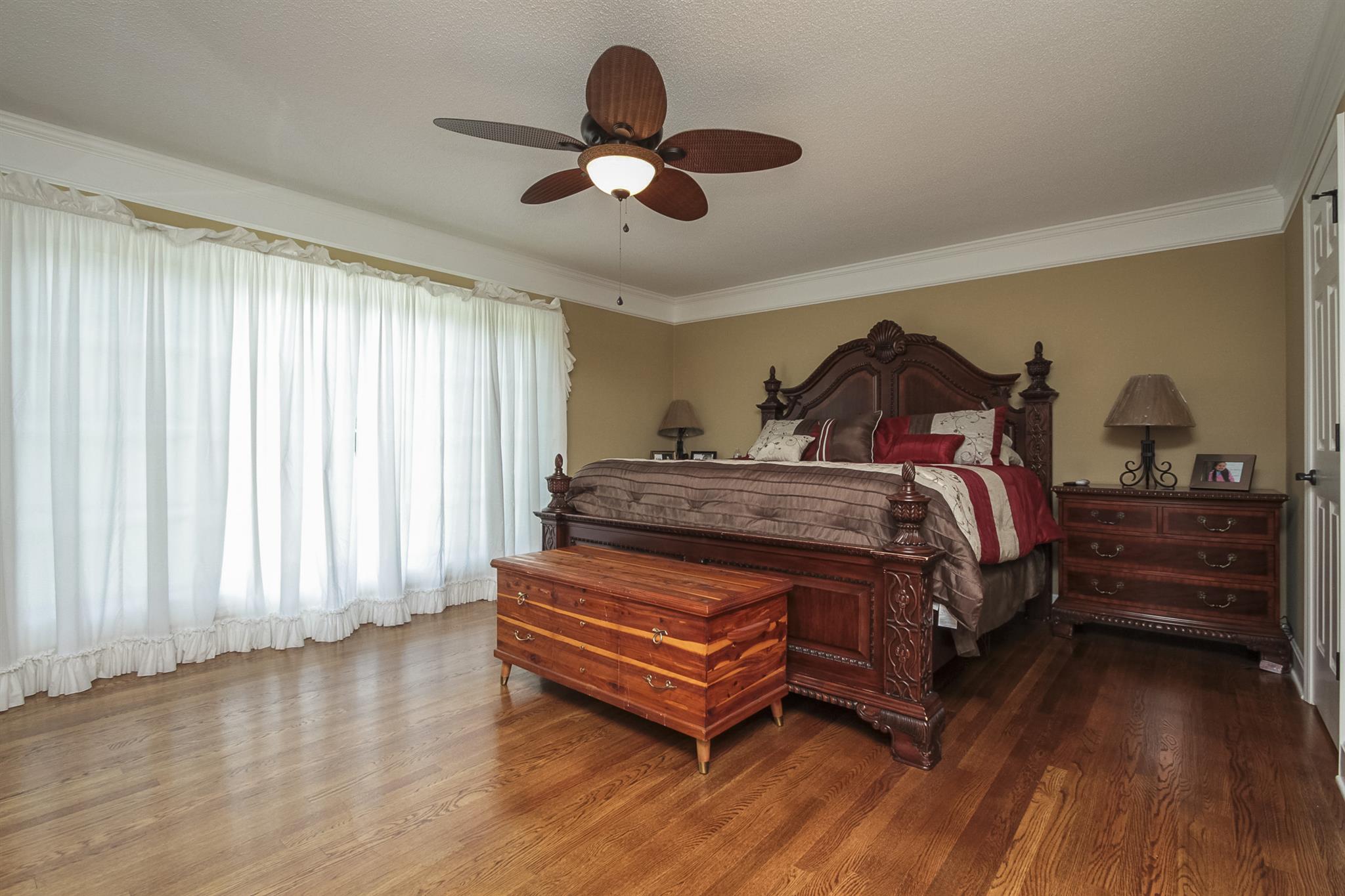 962 Alford Road Murfreesboro, TN 37129 - Photo 16 of 29 a bedroom with a bed and wooden floor