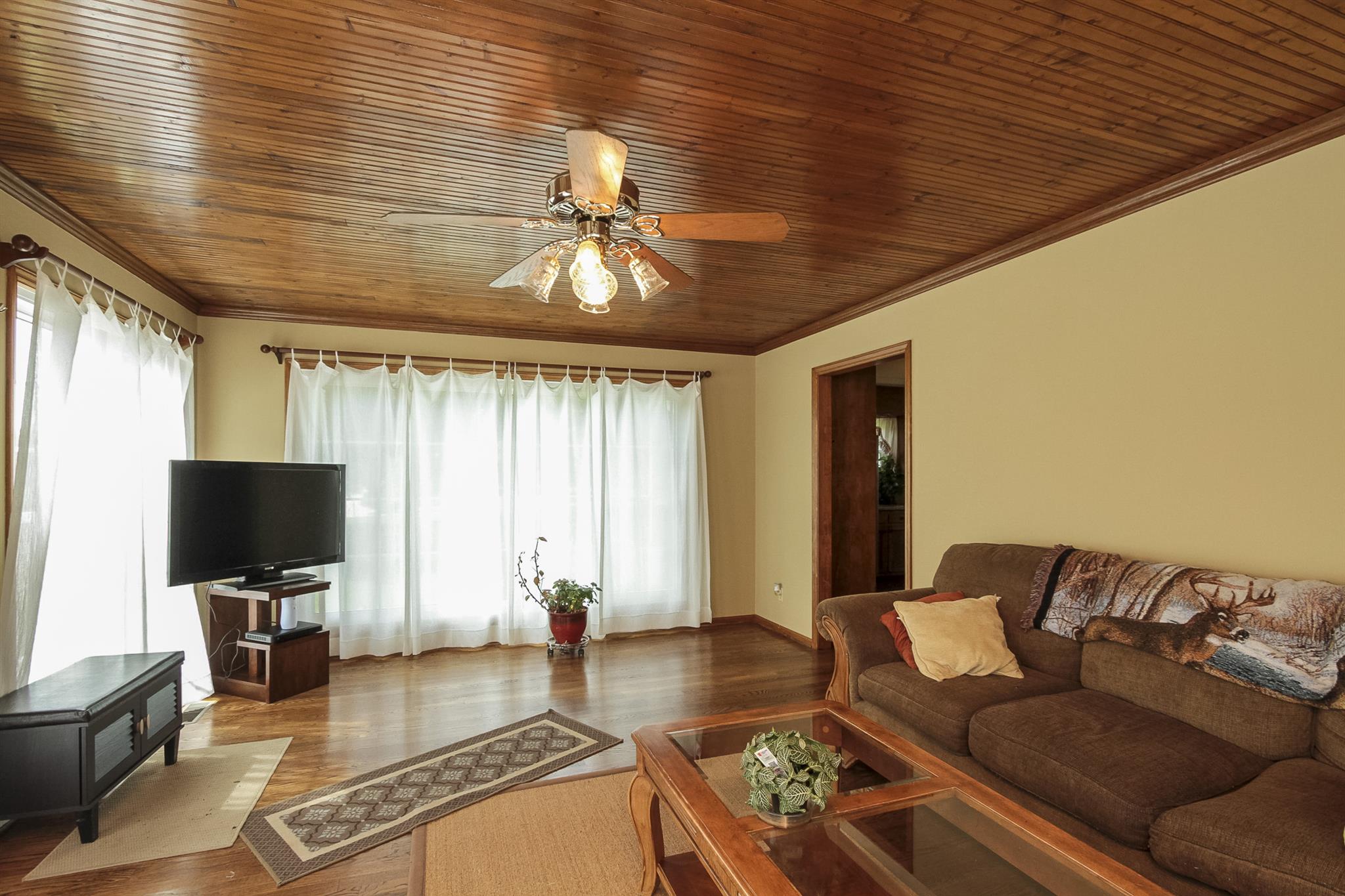 962 Alford Road Murfreesboro, TN 37129 - Photo 22 of 29 a living room with furniture and a flat screen tv
