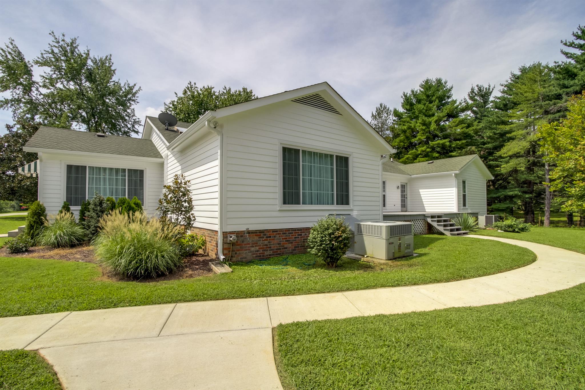 962 Alford Road Murfreesboro, TN 37129 - Photo 23 of 29 a front view of a house with garden