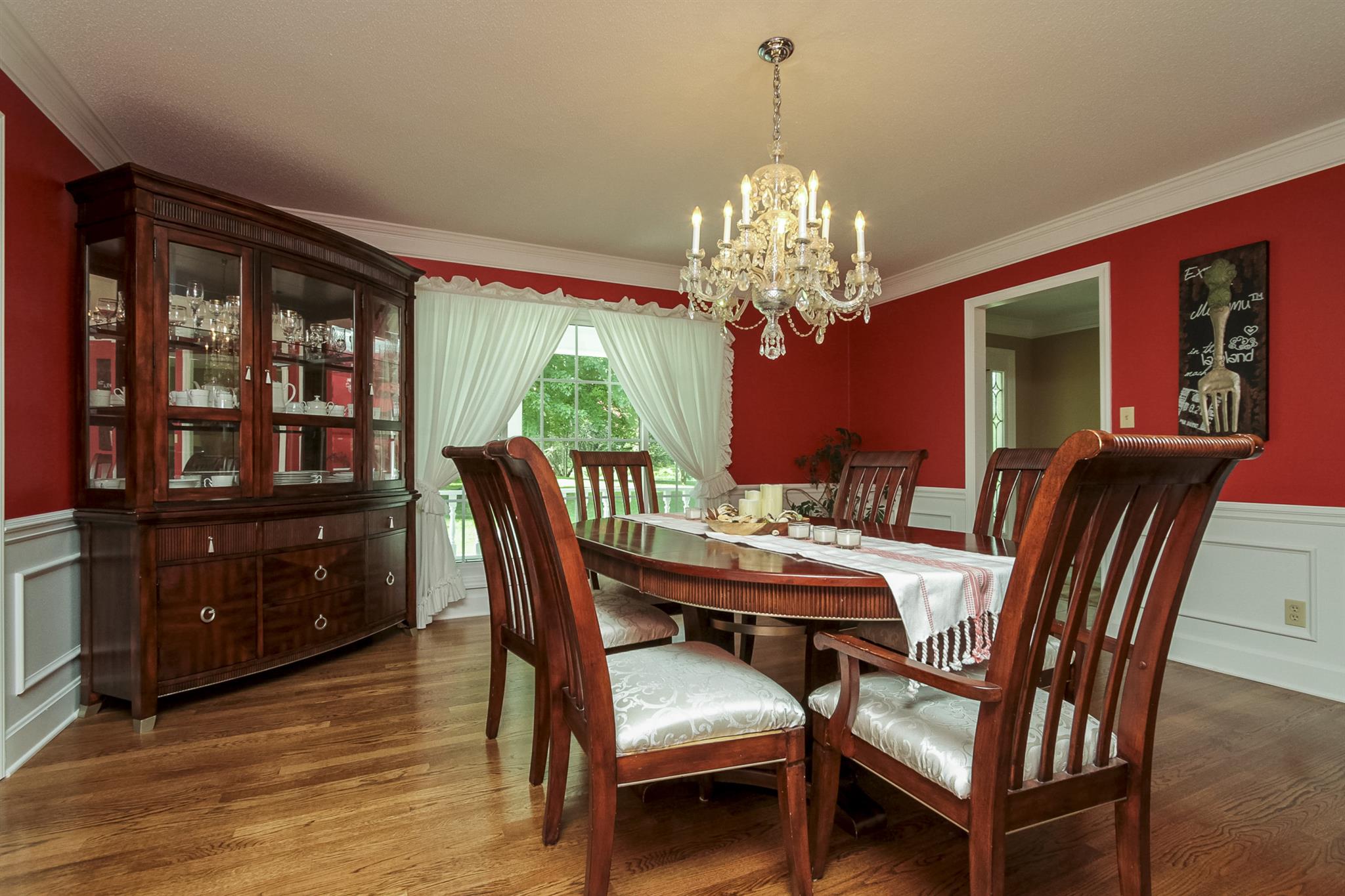 962 Alford Road Murfreesboro, TN 37129 - Photo 4 of 29 a view of a dining room with furniture a chandelier and wooden floor