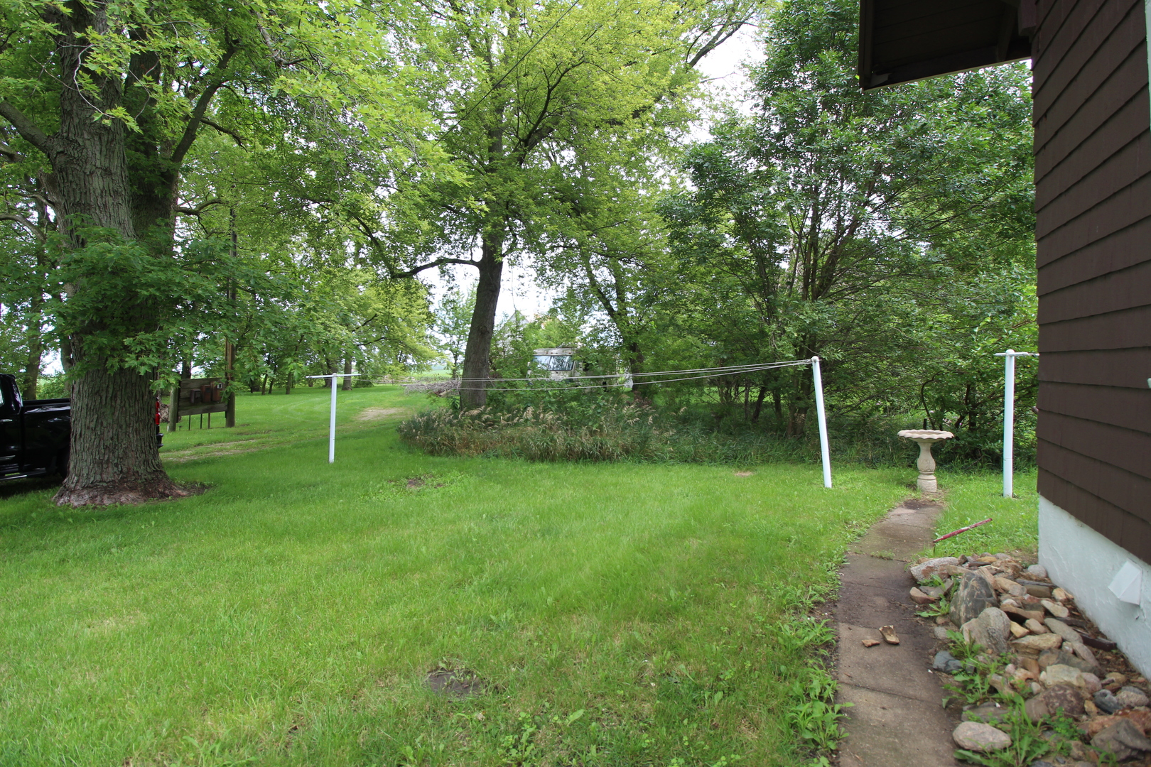 3523 West 2000 S Road Kankakee, IL 60901 - Photo 20 of 20 a backyard of a house with lots of green space