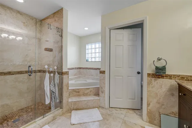 a living room with wooden floor and furniture