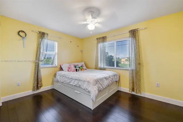 a bathroom with a sink toilet tub and shower