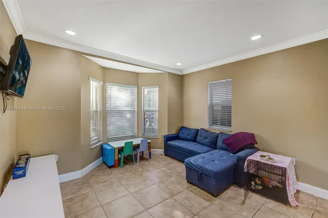 a view of a backyard with sitting area