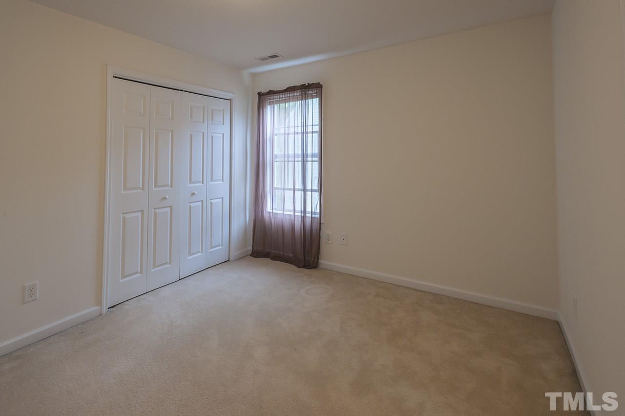 3239 Polite Lane Raleigh, NC 27610 - Photo 16 of 17 an empty room with windows
