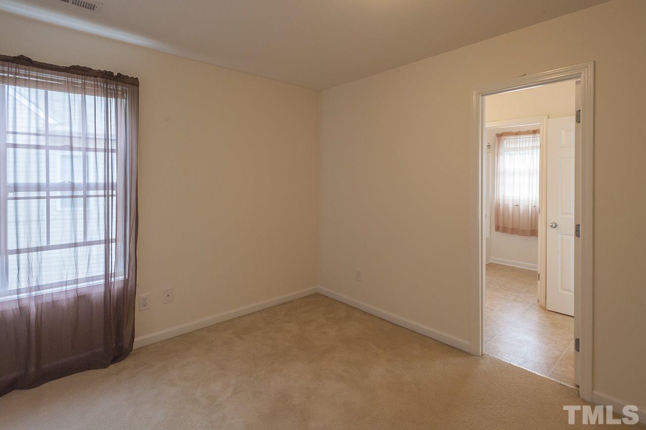 3239 Polite Lane Raleigh, NC 27610 - Photo 17 of 17 an empty room with windows