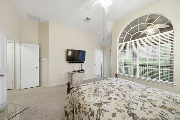 a kitchen with stainless steel appliances granite countertop a stove top oven a sink dishwasher a refrigerator and a microwave