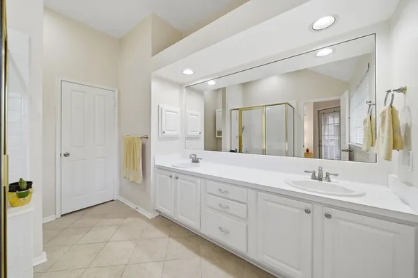 a kitchen with stainless steel appliances granite countertop a stove top oven a sink dishwasher and a microwave oven on the blue kitchen countertops