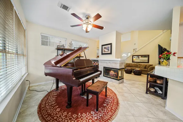 a bed room with a bed and a chandelier