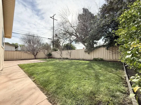 a view of backyard with furniture