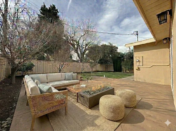 a backyard of a house with lots of green space