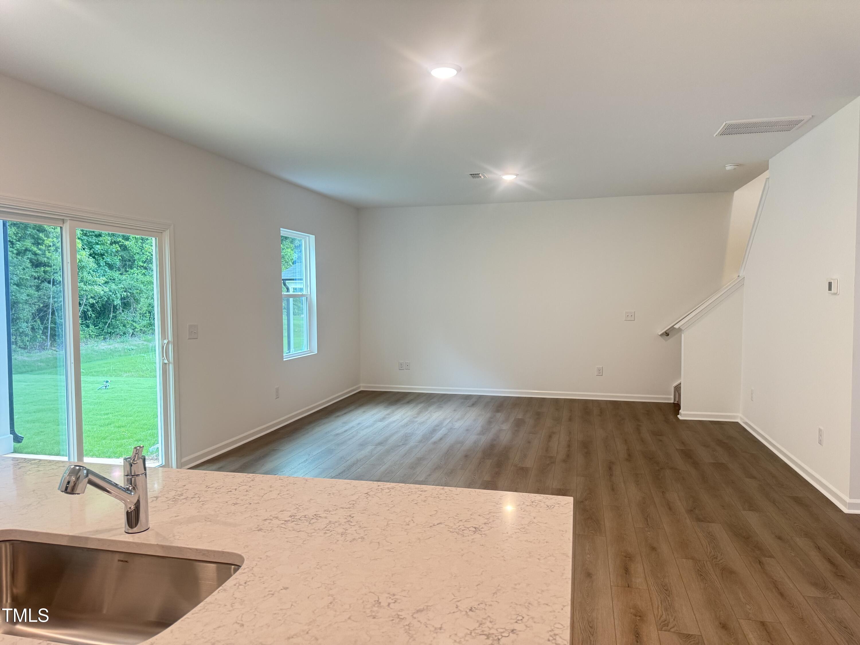 6828 Galloway Drive Middlesex, NC 27557 - Photo 5 of 32 a kitchen with a sink and a large window