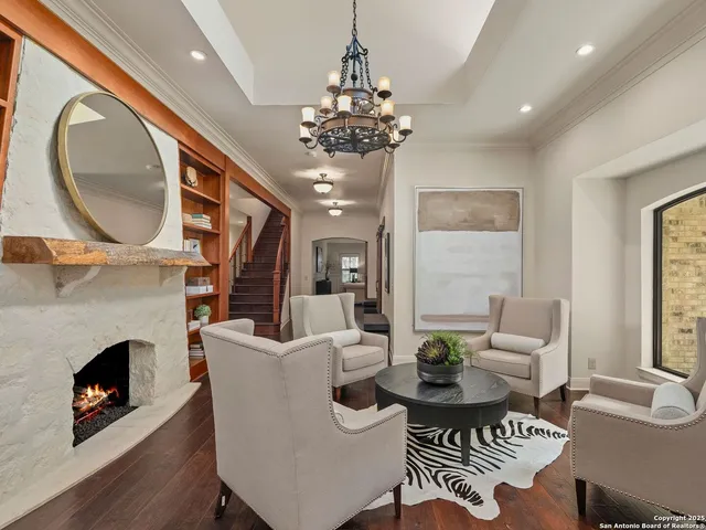 a room with two separate beds and a couch