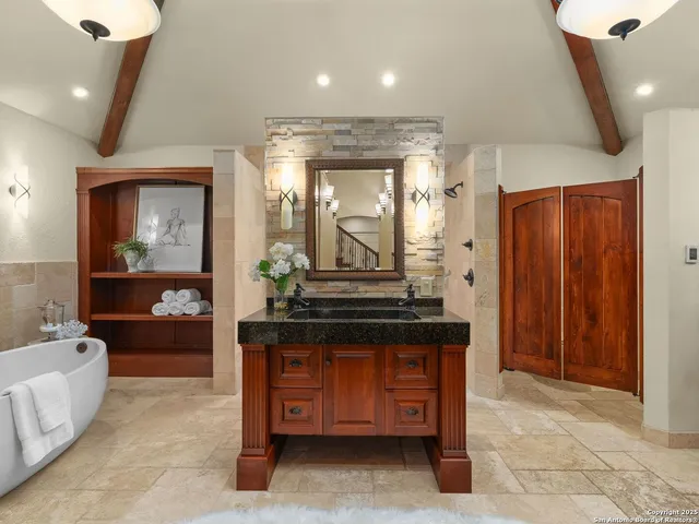 a dining room with furniture window and wooden floor