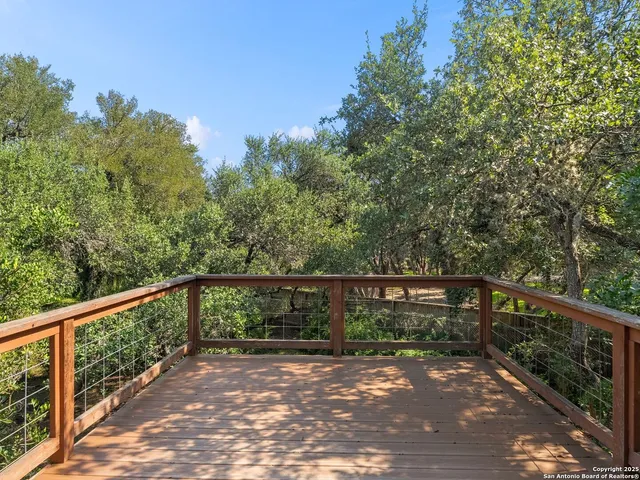 a view of a house with a yard and garage