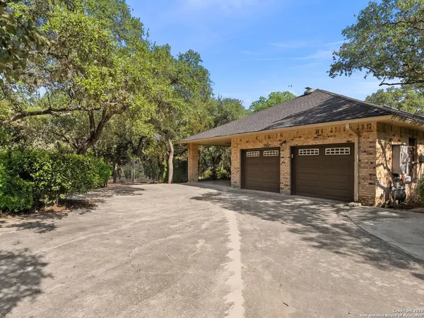 an aerial view of house with yard