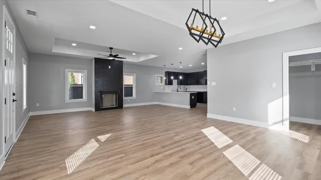 a view of a kitchen and a chandelier