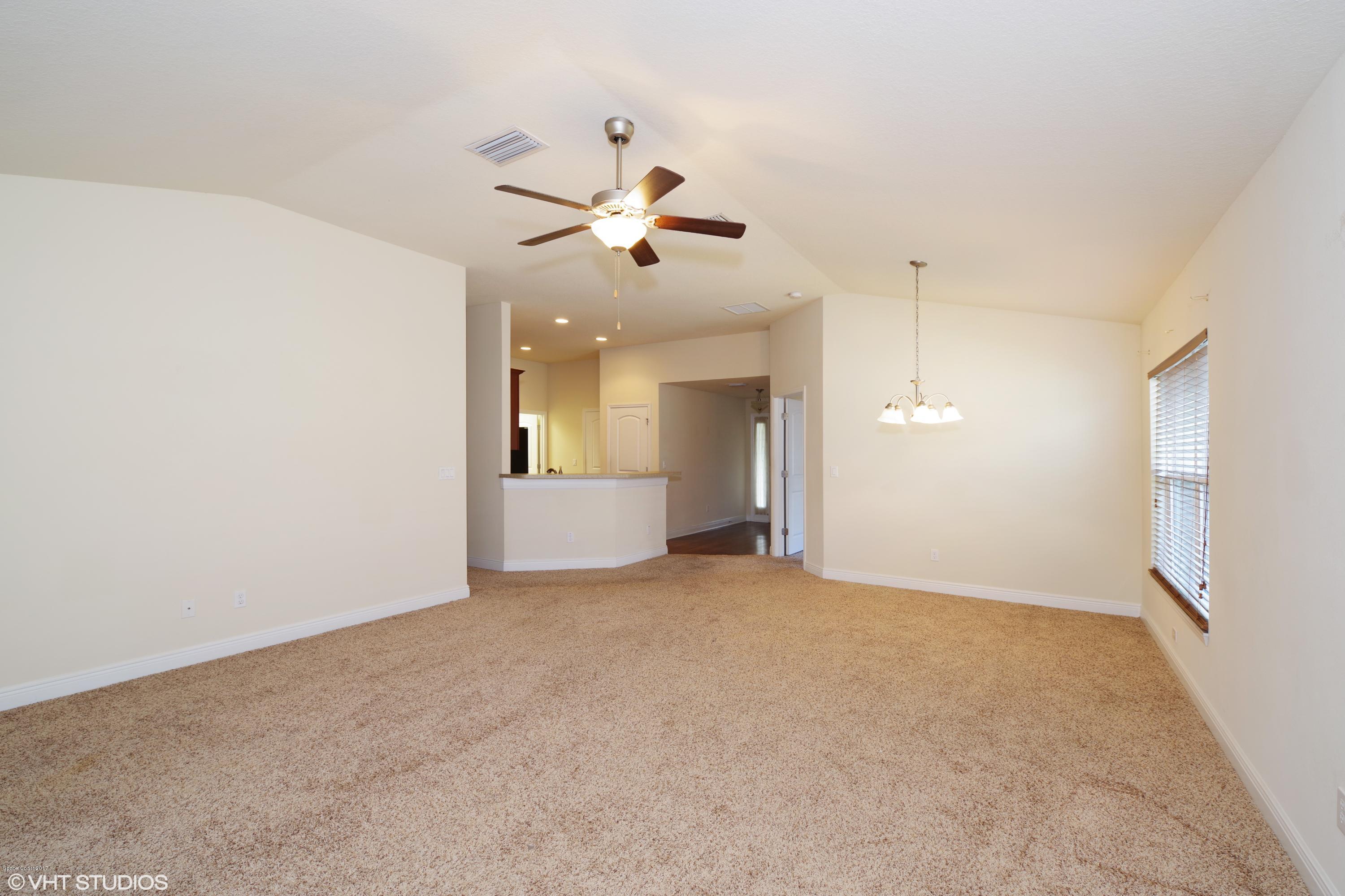 2073 Raleigh Drive Titusville, FL 32780 - Photo 3 of 10 Living/dining room area