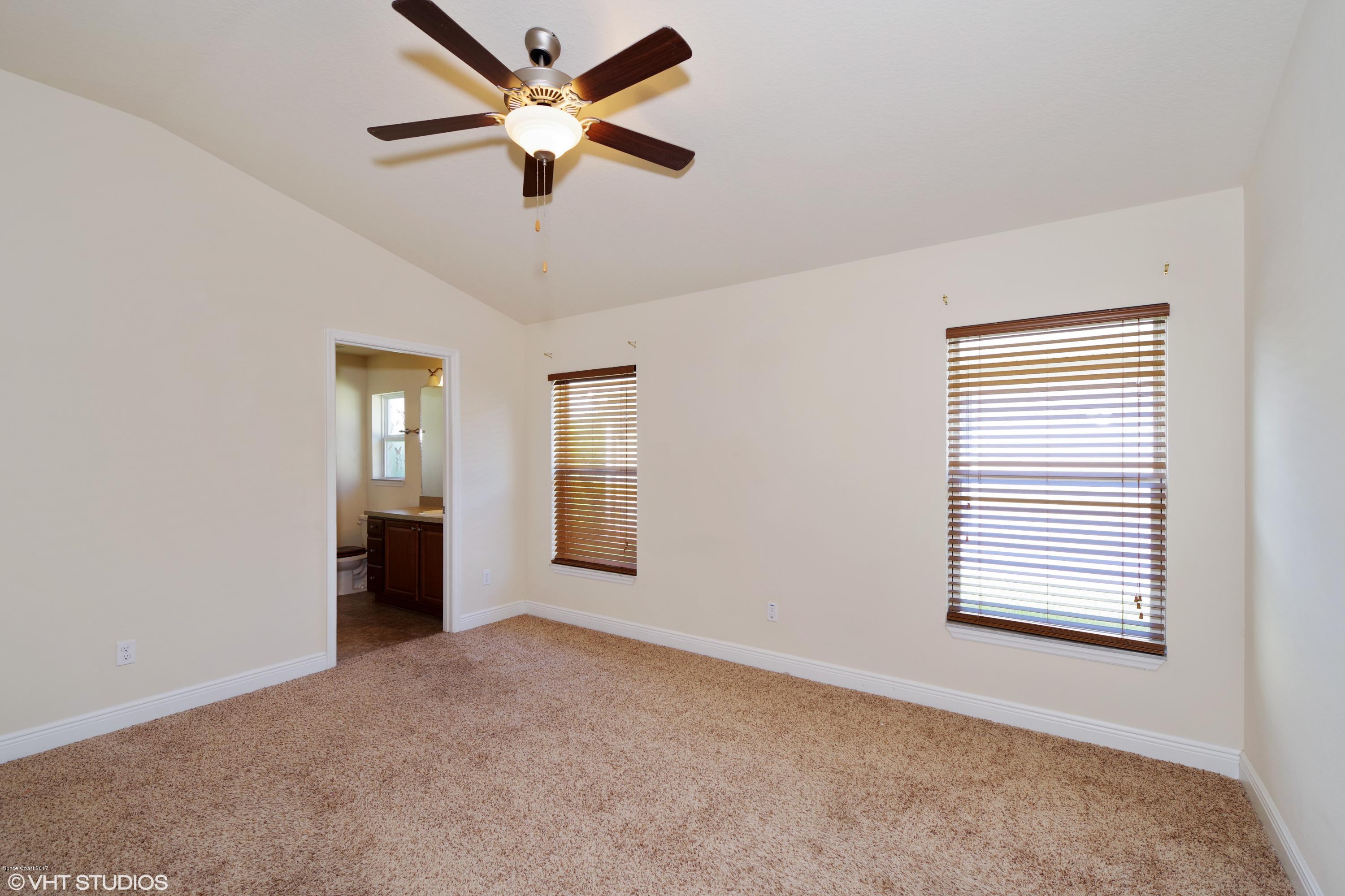 2073 Raleigh Drive Titusville, FL 32780 - Photo 4 of 10 master bedroom