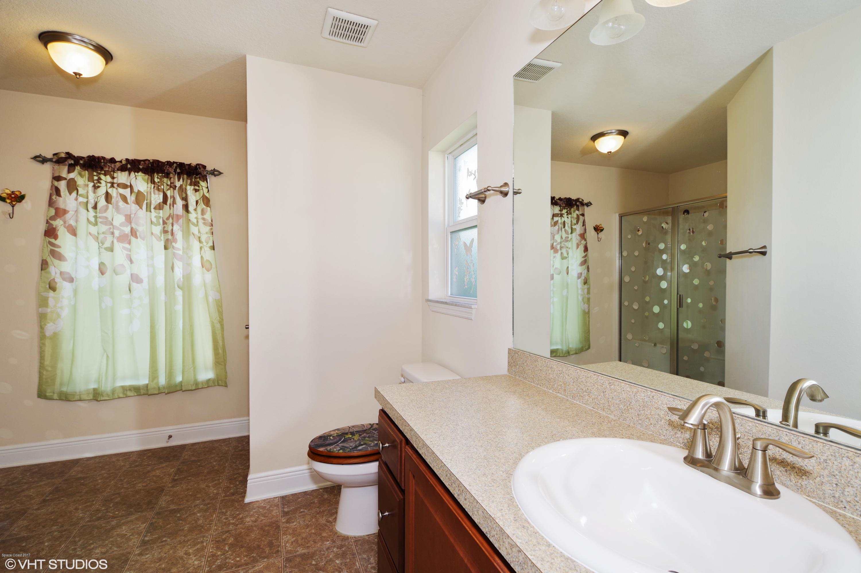 2073 Raleigh Drive Titusville, FL 32780 - Photo 5 of 10 master bath area