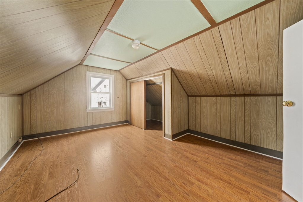 14 Crescent Road Weymouth, MA 02191 - Photo 13 of 19 an empty room with wooden floor and windows