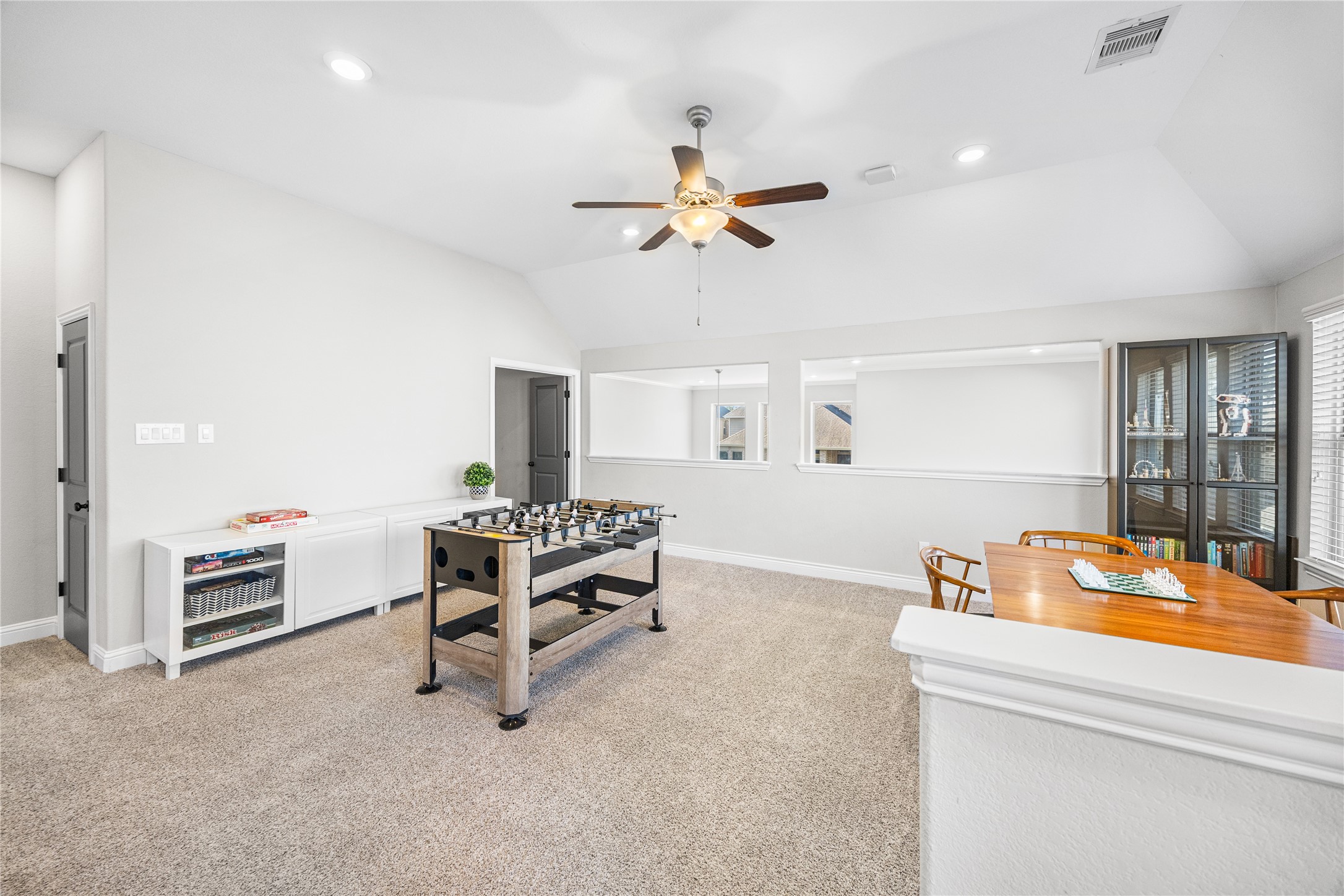 4320 Silver Oak Place Spring, TX 77386 - Photo 19 of 42 Comfortable upstairs area perfect for a game room or additional living space.