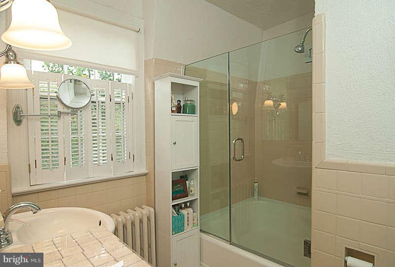 5202 Goddard Road Bethesda, MD 20814 - Photo 16 of 21 Hall Bath with glass enclosed shower & tub