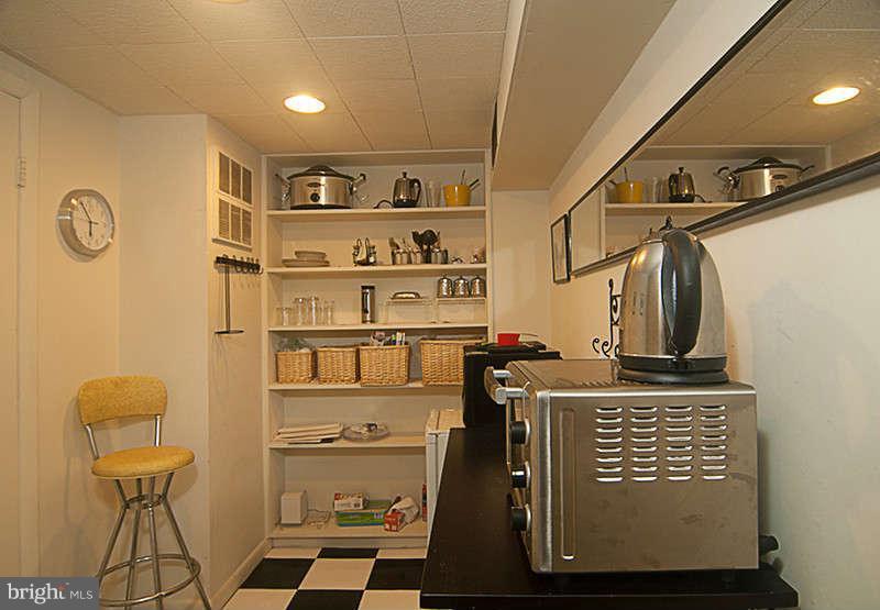 5202 Goddard Road Bethesda, MD 20814 - Photo 19 of 21 Lower Level Kitchenette w/shelving & pantry