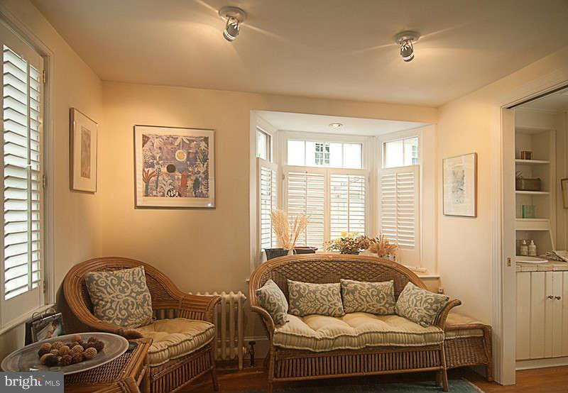 5202 Goddard Road Bethesda, MD 20814 - Photo 7 of 21 Sun Room with shuttered windows