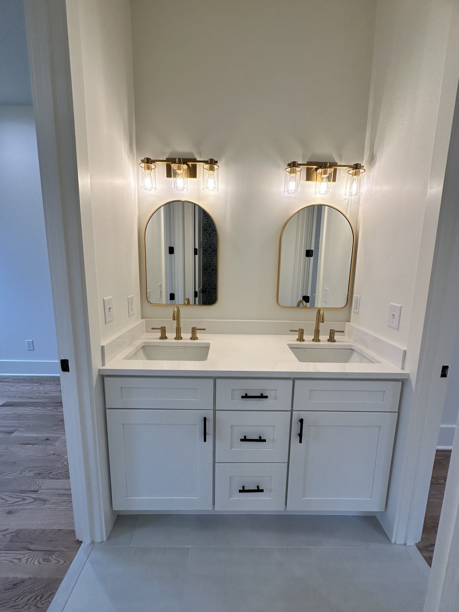 687 Burford Road Lebanon, TN 37087 - Photo 20 of 30 a bathroom with a double vanity sink and a mirror
