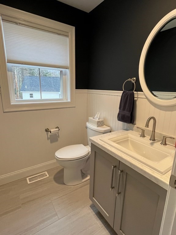 290 Deer Bay Road Ashby, MA 01431 - Photo 8 of 31 a bathroom with a toilet sink and mirror
