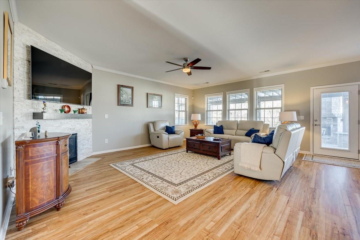 2350 Talon Point Circle Fort Mill, SC 29715 - Photo 12 of 45 a living room with furniture and a flat screen tv