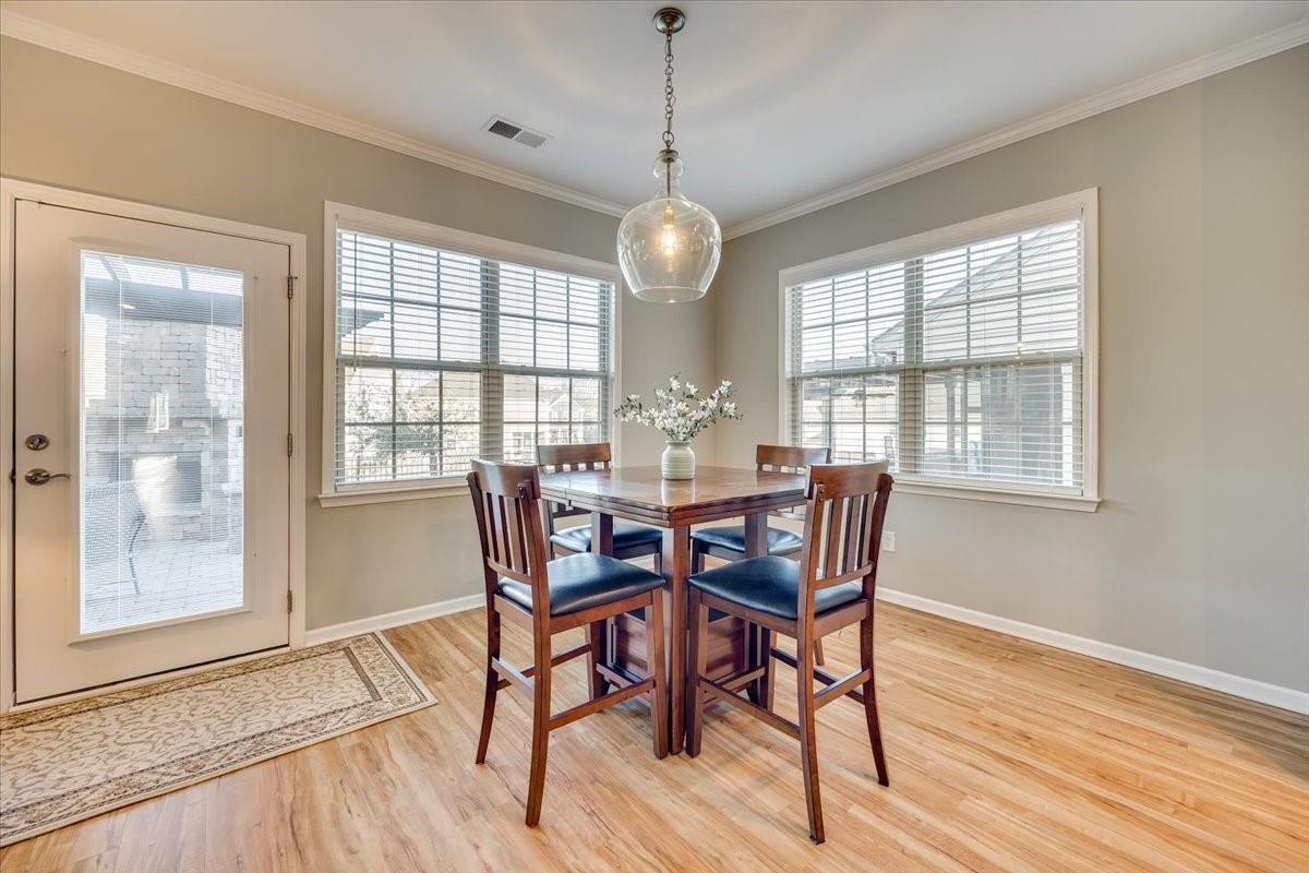 2350 Talon Point Circle Fort Mill, SC 29715 - Photo 18 of 45 a view of a dining room with furniture window and wooden floor