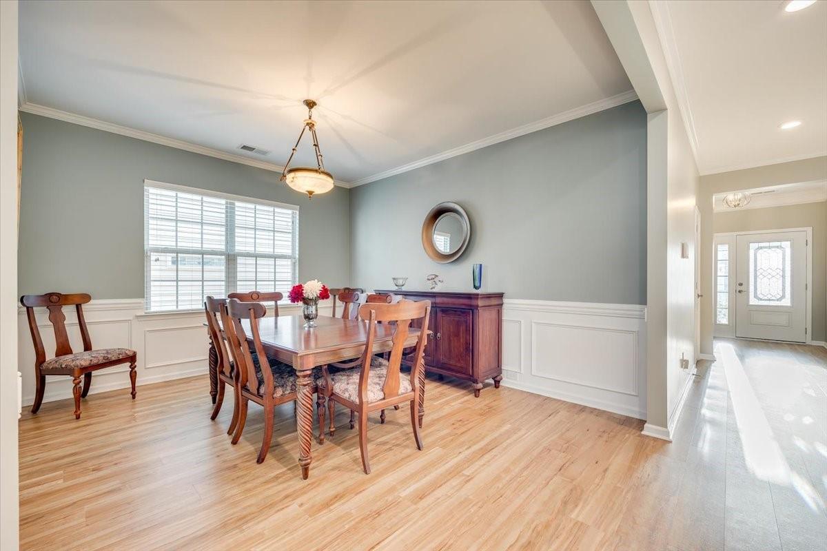 2350 Talon Point Circle Fort Mill, SC 29715 - Photo 20 of 45 a view of a dining room with furniture window and wooden floor