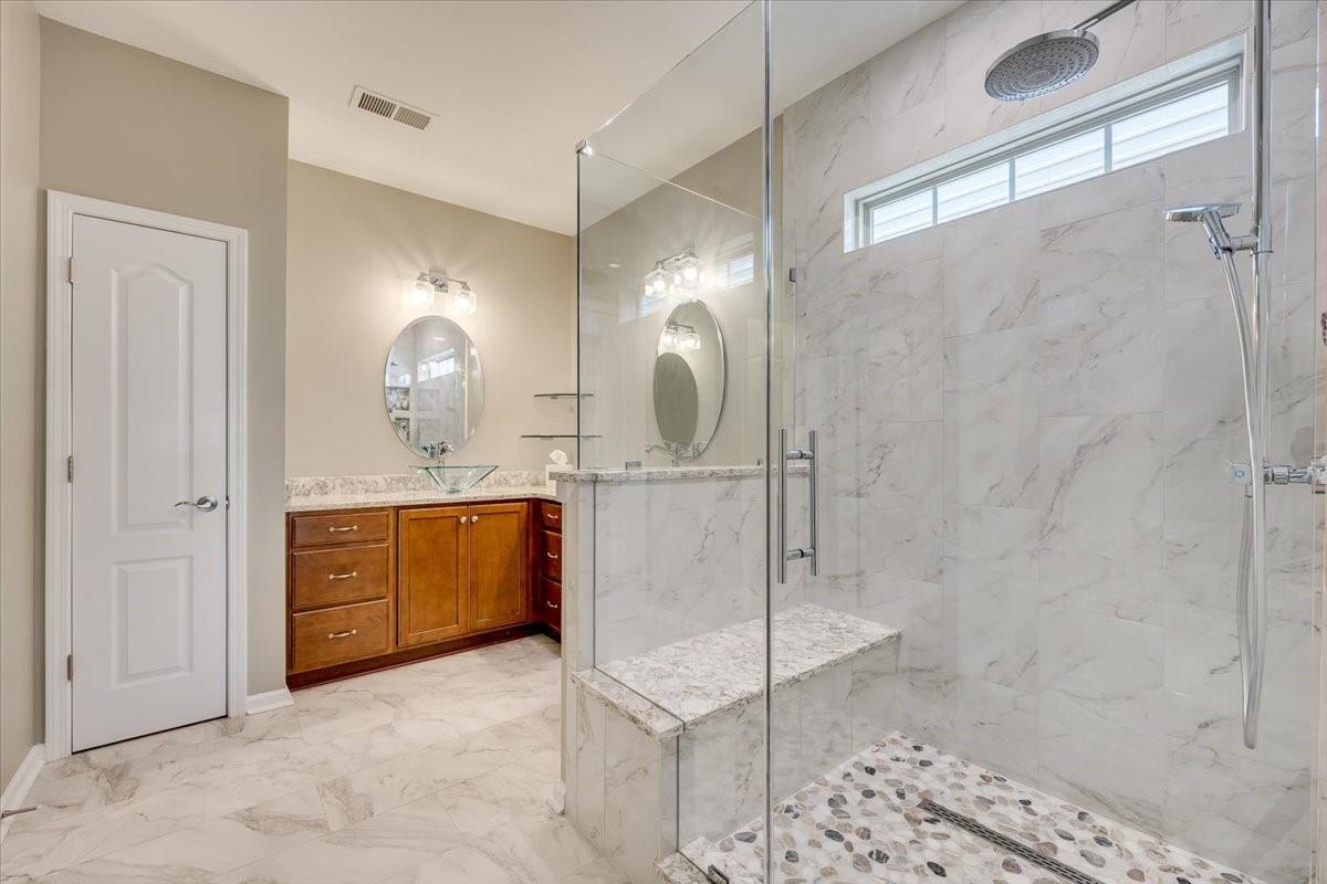 2350 Talon Point Circle Fort Mill, SC 29715 - Photo 27 of 45 a bathroom with a double vanity sink mirror and shower