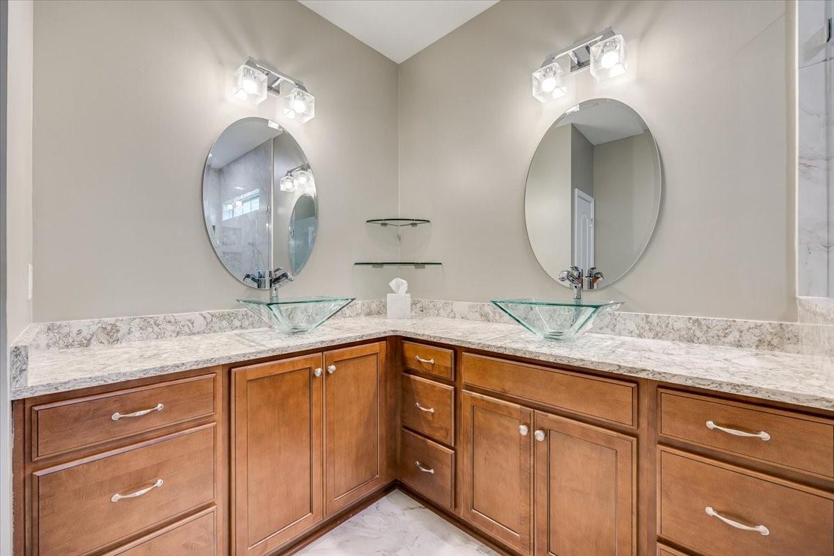 2350 Talon Point Circle Fort Mill, SC 29715 - Photo 28 of 45 a bathroom with a granite countertop sink a mirror and vanity
